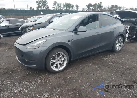 2023 Tesla Model Y Rwd from USA, damaged, VIN 7SAYGDED3PF966665